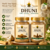 Two jars of DHUNI herbal resin powders with gold lids on a wooden surface, labeled Vedic Arpan and 51 Herbs Powder, cream background.